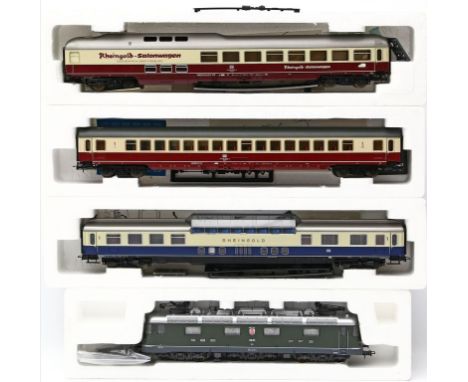 E-Lok und 3 D-Zug-Wagen, Lima H0. Verschiedene Art.-Nrn., für Gleichstrombetrieb. Je in Originalverpackung. L. bespielt.