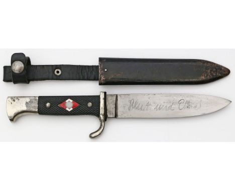 Dolch "K 7/27", 2. WK. Spitz zulaufende Rückenklinge mit Devise "Blut und Ehre", ohne Herstellermarke. Eisengriff mit Holz-Gr