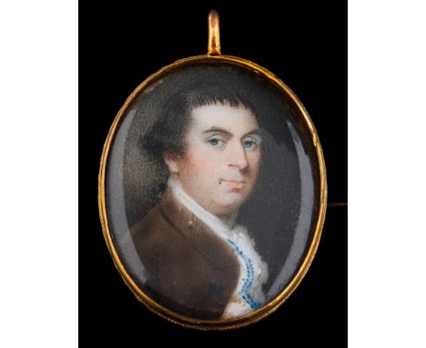 English School early 18th Century-A miniature portrait of a gentleman,: head and shoulders with short dark fringe and blue ey