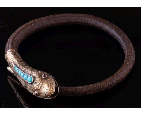 A mid 19th Century gold and turquoise mounted snake head hair bangle: with cabochon-set eyes, approximately 18gms gross weigh