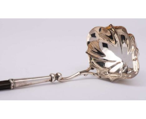 A Georgian silver toddy ladle, maker's mark worn, London, date letter worn: of cartouche-shaped outline on a spiral twist wha
