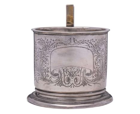 An Imperial Russian silver tumbler holder, maker M.P., assay master A.P, Moscow, 1885: of cylindrical outline with engraved f