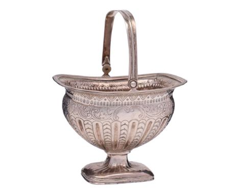 A Dutch silver swing-handled pedestal sugar basin, bears Dutch tax mark: of rectangular tapering outline, with fluted and emb