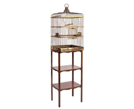 A brass wirework square parrot cage: with slightly domed top and central brass ring handle, having interior brass half round 