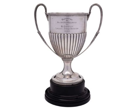 An Edward VII silver twin-handled trophy cup, maker Goldsmiths & Silversmiths Co Ltd, London, 1907: inscribed, of traditional