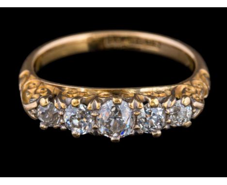 A gold and graduated diamond five-stone ring: set with round old brilliant-cut diamonds estimated to weigh a total of 0.80ct 