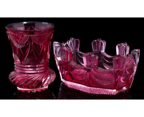 A Bohemian ruby flashed cut glass bowl and a similar beaker: the octagonal bowl on hobnail cut base, 17 cm. wide; the beaker 