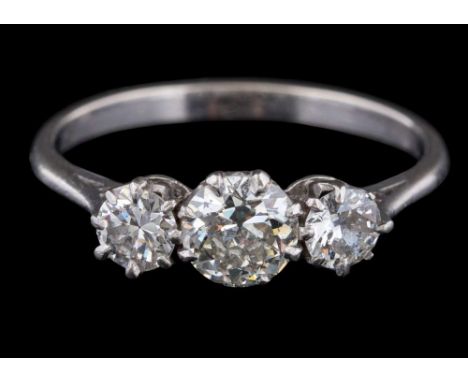 A diamond three-stone ring: set with round old brilliant-cut diamonds, the principal diamond approximately 5.3mm diameter x 3