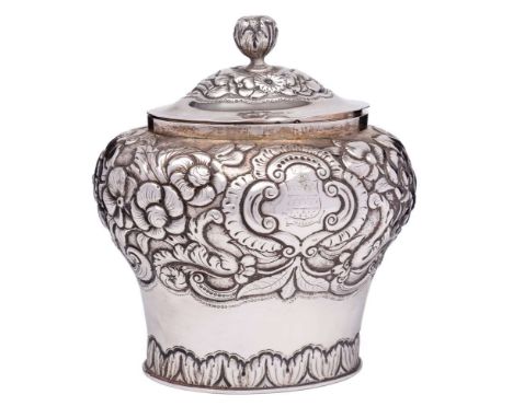 A George IV Irish silver tea caddy and cover, maker William Nolan, Dublin, 1826: crested, of ovoid form with shallow domed li
