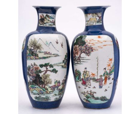 A pair of Chinese famille rose/verte vases: of ovoid form with waisted necks and flared rims, painted with panels of deer, fl