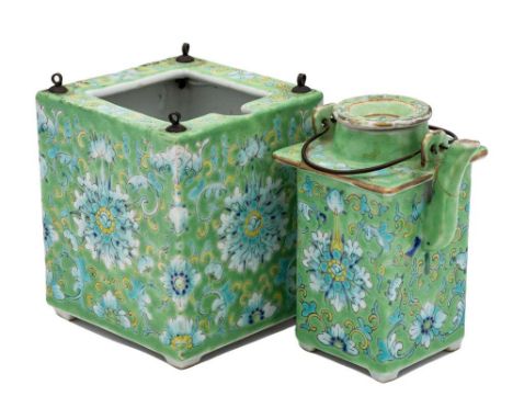 A Chinese wine pot, cover and outer case, probably for the Straits market: enamelled with a baoxiang lotus scroll pattern on 