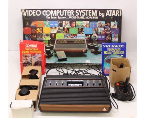 Atari: A boxed Atari Video Computer System, Model No. CX-2600, with original receipt. The vendor informs us this lot is compl