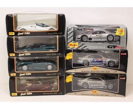 Maisto: A collection of seven boxed Maisto scale diecast models to comprise: Mercedes-Benz CLK-DTM 2000 (two examples), Merce