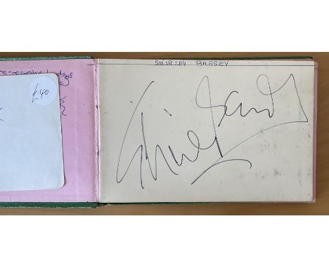 Vintage Autograph book containing 65 pages of fantastic signatures. Includes signatures of Shirley Bassey, The Raindrops, Fra