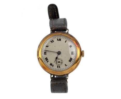 EIGHTEEN CARAT GOLD CASED MANUAL WIND WRIST WATCH, the round dial with Roman hour markers, railroad seconds track and subsidi