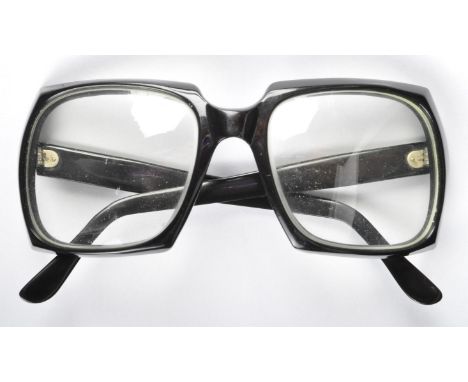 Estate of Dave Prowse - a pair of Mr Prowse's personally worn daily spectacles / glasses. Typical 1970s thick-rim design, of 