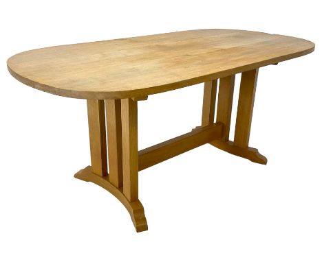 Solid light oak dining table, rounded rectangular top on a series of upright supports, curved sledge feetDimensions: Height:&