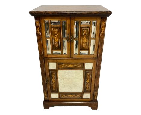 Late Victorian inlaid walnut music cabinet, the two top cupboard doors decorated with rectangular bevelled mirror plates and 