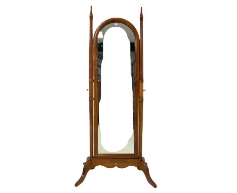Victorian design mahogany framed full-length cheval mirror, pointed finials atop pilasters with moulded rings, the shaped apr