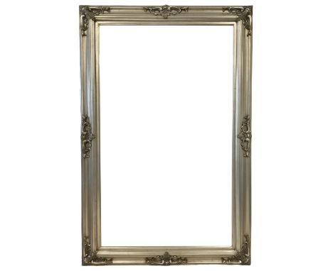 Large rectangular wall mirror, moulded and silvered frame decorated with foliage cartouches, bevelled glass plateDimensions: 