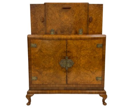 G & F Gold Feather Products Ltd. Leeds - early to mid-20th century figured walnut cocktail cabinet, double hinged central sec