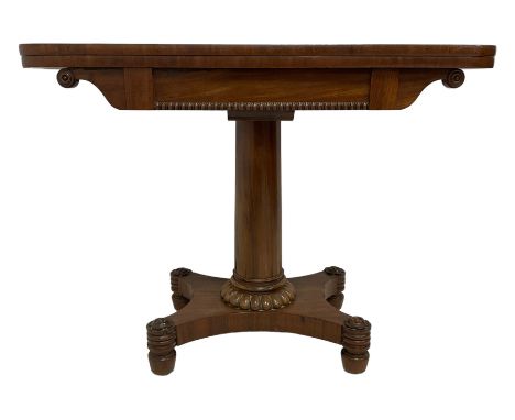 Regency plum pudding mahogany card table, fold over revolving top revealing baize lined playing surface, frieze with moulded 