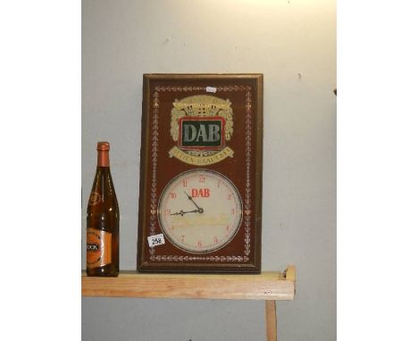 An original DAB German Premier Beer wall clock.