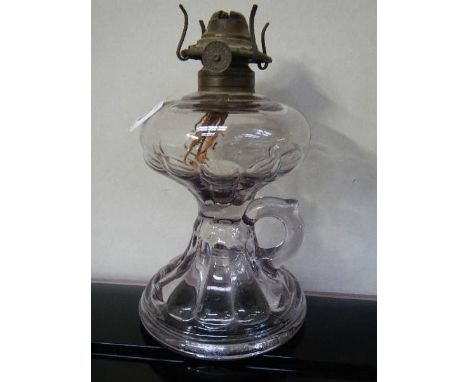 An unusual purple tinted glass finger oil lamp, no chimney