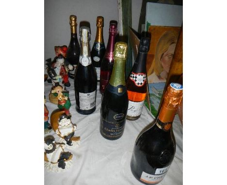 Seven bottles of sparkling wine.  (Collect only)