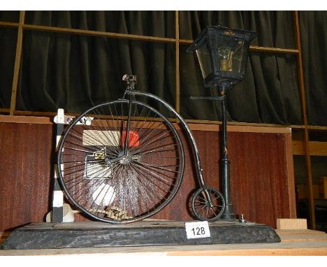 A vintage scratch built table lamp of a penny farthing next to lamp post ****Condition report**** Base 43cm x 15cm.Front whee