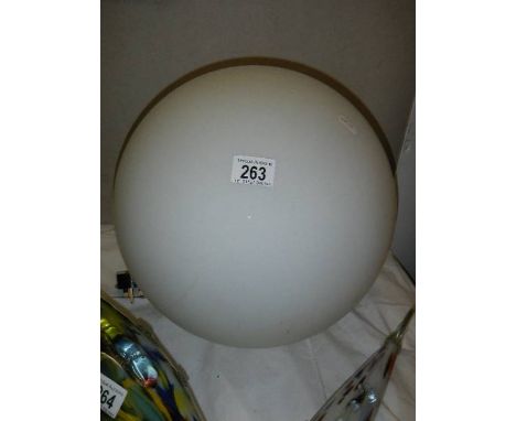 A large glass globe light.  (Collect only)