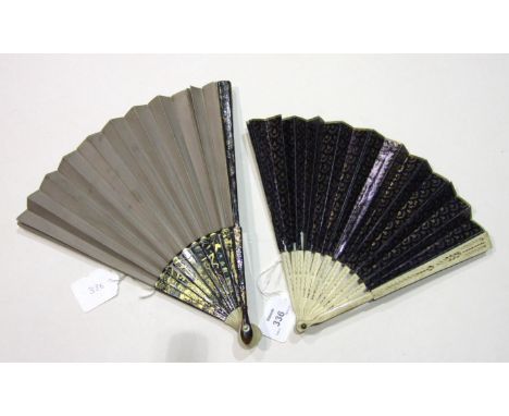 A Chinese fan with tortoiseshell and lacquered guards and ivory and lacquered sticks, all embellished with mother-of-pearl an