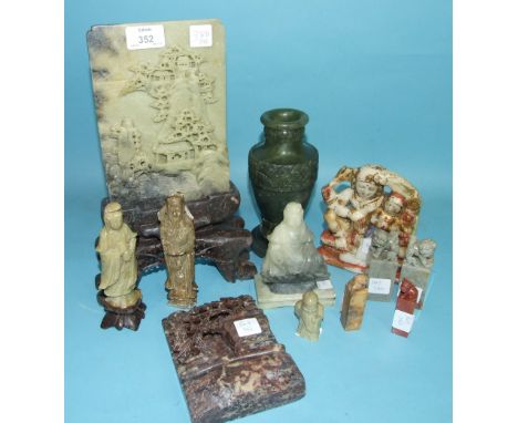 A large Chinese soapstone landscape panel on stand, four soapstone figures, four seals with Qilin finials and other pieces, (