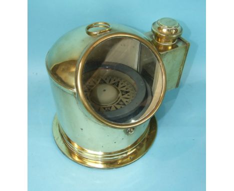 A brass ship's binnacle complete with burner and gimbal-mounted compass, 27cm high.