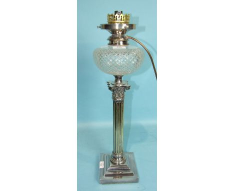 A silver-plated Corinthian column oil lamp with cut glass reservoir, 54cm high with later electric conversion kit.