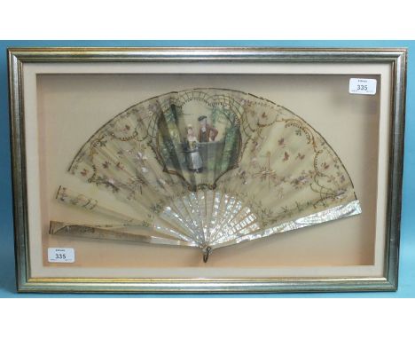 A 19th century fan with mother-of-pearl guards and sticks and signed painted gauze leaf depicting a courting couple in a cart