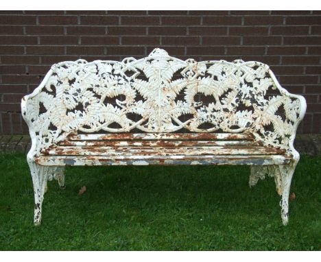 A cast iron fern pattern garden bench, 151cm wide, (old repairs to back).