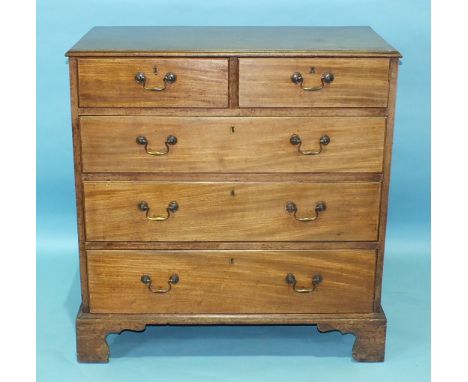 A George III mahogany rectangular chest of two short and three long moulded-edge oak-lined drawers, on bracket feet, 93cm wid