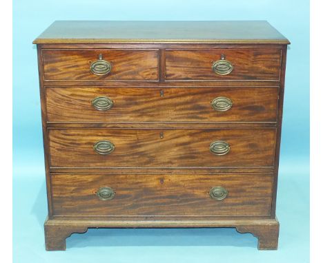 A George III mahogany rectangular chest of two short and three long cockbeaded drawers, on bracket feet, 102cm wide, 95cm hig