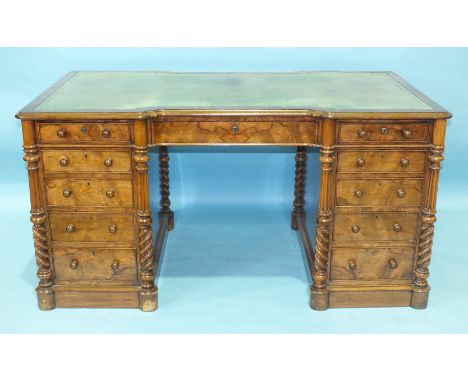 A good quality Victorian walnut knee-hole writing desk, the rectangular top on inverted breakfront form with inset writing su