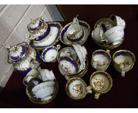 A mid-19th century English porcelain part tea service decorated with flowers on a blue, yellow and gilt ground, forty pieces.