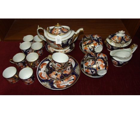 An early-19th century English porcelain Imari pattern part tea service, thirty pieces.