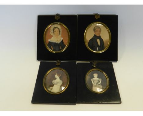 Two pairs of 19th Century portrait miniatures; two attributed to T.Martin of a gentleman and a lady in contemporary dress, go