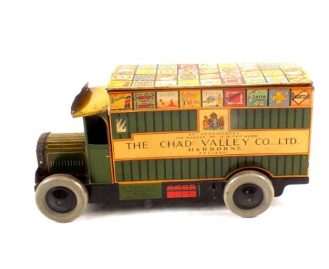Chad Valley tin plate clockwork delivery van with Chad Valley logo, the roof with games advertising (missing tailgate)