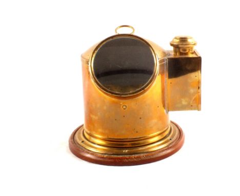A marine compass marked A.Carstens Hamburg, mounted within a brass helmet binnacle