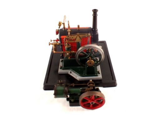 A Cotswold Heritage stationary steam engine, Thor plus a flywheel accessory