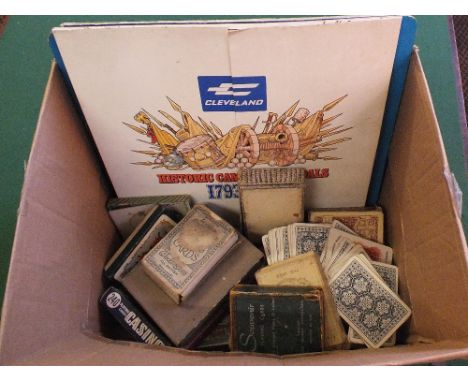 Various vintage playing cards plus various carded medallions