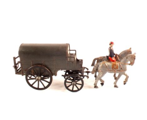 A French tin plate Army covered wagon with two horses and driver