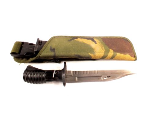 A S.A.80 bayonet and scabbard within its issue D.P.M. frog with a No.4 spike bayonet