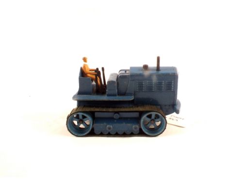 A Dinky 563 Blaw Knox heavy tractor in blue with light blue hubs and brown driver